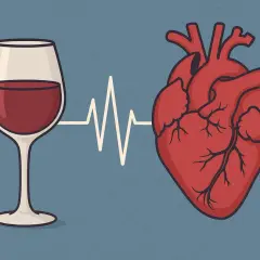 Kieliszek czerwonego wina połączony linią EKG z sercem. Czy alkohol podnosi ciśnienie?